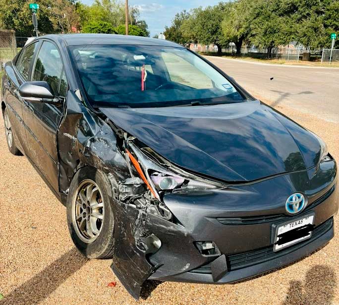 Wrecked Toyota Prius hybrid purchased by Junk Car Buyers R-Us in Mission Bend, TX.