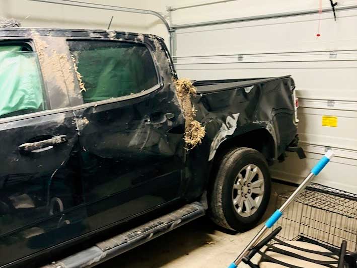A wrecked 2015 Chevy Colorado was stored in a garage in La Marque, TX, and was picked up by Junk Car Buyers R-Us.